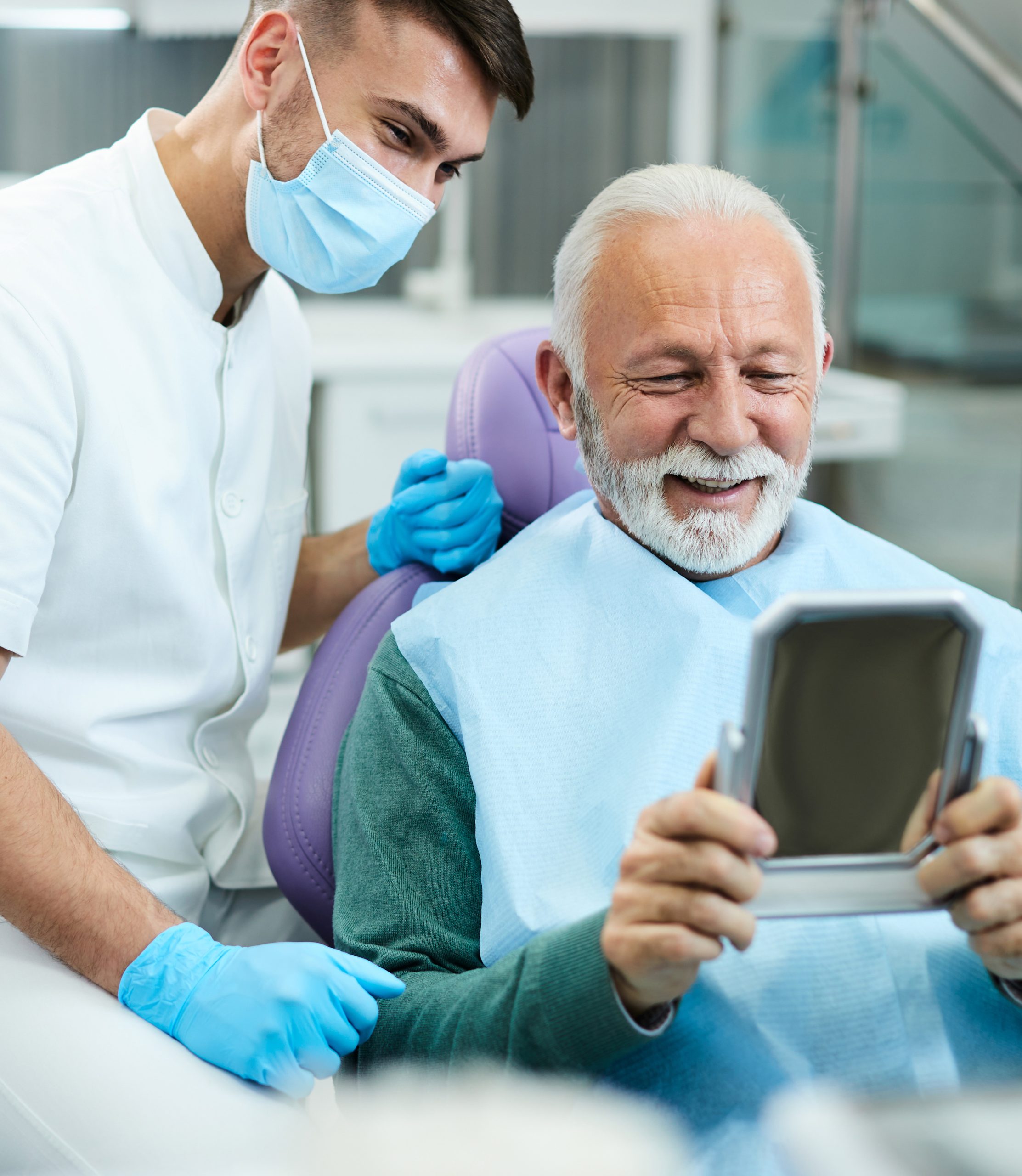 Man is sitting in a dental chair